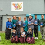 The 'One Book One Community' initiative in the Our Lady of Lourdes community sees young readers and families bring one of 700 books into their homes and was organised by Our Lady of Lourdes, Local Education Committee (LEC). Pictured are Mary Kavanagh, LEC committee from Colaiste Nano Nagle, Julianne Ryan, LEC parent, Tracy Fitzgerald, LEC secretary, Jonna Malone LEC committee treasurer, Mary Ryan Rose, Limerick and Clare Education and Training Board, Evan O'Grady, LEC Chairperson, Tommy Giltenane, LEC committee from St Clement's College (back) with Rhiann, Tori and Ariana, puplis from Colaiste Nano Nagle (front). Picture: Olena Oleksienko/ilovelimerick