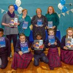 The 'One Book One Community' initiative in the Our Lady of Lourdes community sees young readers and families bring one of 700 books into their homes and was organised by Our Lady of Lourdes, Local Education Committee (LEC). Pictured are Mary Ryan Rose, Limerick and Clare Education and Training Board, Jonna Malone, LEC treasurer, Tracy Fitzgerald, LEC committee secretary, Julianne Ryan, LEC committee parent (back) pictured with pupils Michael, Our Lady of Lourdes NS, Rhiann, Colaiste Nano Nagle, Abel, Our Lady of Lourdes NS and Ariana and Tori from Colaiste Nano Nagle (front). Picture: Olena Oleksienko /ilovelimerick