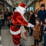 Santa arrived at the Crescent Shopping Centre 
on Sunday, December 1st, 2024 and he greeted families at the Garryowen Mall entrance before leading a merry parade to his Grotto on City Mall. Picture: Olena Oleksienko/ilovelimerick