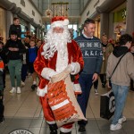 Santa arrived at the Crescent Shopping Centre 
on Sunday, December 1st, 2024 and he greeted families at the Garryowen Mall entrance before leading a merry parade to his Grotto on City Mall. Picture: Olena Oleksienko/ilovelimerick