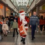 Santa arrived at the Crescent Shopping Centre 
on Sunday, December 1st, 2024 and he greeted families at the Garryowen Mall entrance before leading a merry parade to his Grotto on City Mall. Picture: Olena Oleksienko/ilovelimerick