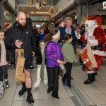 Santa arrived at the Crescent Shopping Centre 
on Sunday, December 1st, 2024 and he greeted families at the Garryowen Mall entrance before leading a merry parade to his Grotto on City Mall. Picture: Olena Oleksienko/ilovelimerick