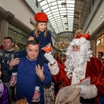 Santa arrived at the Crescent Shopping Centre 
on Sunday, December 1st, 2024 and he greeted families at the Garryowen Mall entrance before leading a merry parade to his Grotto on City Mall. Picture: Olena Oleksienko/ilovelimerick
