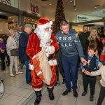Santa arrived at the Crescent Shopping Centre 
on Sunday, December 1st, 2024 and he greeted families at the Garryowen Mall entrance before leading a merry parade to his Grotto on City Mall. Picture: Olena Oleksienko/ilovelimerick