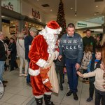 Santa arrived at the Crescent Shopping Centre 
on Sunday, December 1st, 2024 and he greeted families at the Garryowen Mall entrance before leading a merry parade to his Grotto on City Mall. Picture: Olena Oleksienko/ilovelimerick
