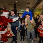 Santa arrived at the Crescent Shopping Centre 
on Sunday, December 1st, 2024 and he greeted families at the Garryowen Mall entrance before leading a merry parade to his Grotto on City Mall. Picture: Olena Oleksienko/ilovelimerick