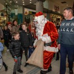 Santa arrived at the Crescent Shopping Centre 
on Sunday, December 1st, 2024 and he greeted families at the Garryowen Mall entrance before leading a merry parade to his Grotto on City Mall. Picture: Olena Oleksienko/ilovelimerick