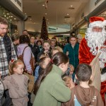 Santa arrived at the Crescent Shopping Centre 
on Sunday, December 1st, 2024 and he greeted families at the Garryowen Mall entrance before leading a merry parade to his Grotto on City Mall. Picture: Olena Oleksienko/ilovelimerick