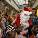 Santa arrived at the Crescent Shopping Centre 
on Sunday, December 1st, 2024 and he greeted families at the Garryowen Mall entrance before leading a merry parade to his Grotto on City Mall. Picture: Olena Oleksienko/ilovelimerick
