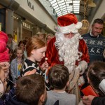 Santa arrived at the Crescent Shopping Centre 
on Sunday, December 1st, 2024 and he greeted families at the Garryowen Mall entrance before leading a merry parade to his Grotto on City Mall. Picture: Olena Oleksienko/ilovelimerick