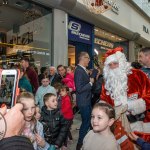 Santa arrived at the Crescent Shopping Centre 
on Sunday, December 1st, 2024 and he greeted families at the Garryowen Mall entrance before leading a merry parade to his Grotto on City Mall. Picture: Olena Oleksienko/ilovelimerick