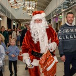 Santa arrived at the Crescent Shopping Centre 
on Sunday, December 1st, 2024 and he greeted families at the Garryowen Mall entrance before leading a merry parade to his Grotto on City Mall. Picture: Olena Oleksienko/ilovelimerick