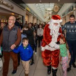 Santa arrived at the Crescent Shopping Centre 
on Sunday, December 1st, 2024 and he greeted families at the Garryowen Mall entrance before leading a merry parade to his Grotto on City Mall. Picture: Olena Oleksienko/ilovelimerick