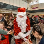 Santa arrived at the Crescent Shopping Centre 
on Sunday, December 1st, 2024 and he greeted families at the Garryowen Mall entrance before leading a merry parade to his Grotto on City Mall. Picture: Olena Oleksienko/ilovelimerick