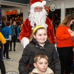 Santa arrived at the Crescent Shopping Centre 
on Sunday, December 1st, 2024 and he greeted families at the Garryowen Mall entrance before leading a merry parade to his Grotto on City Mall. Picture: Olena Oleksienko/ilovelimerick