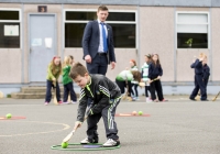 04/06/2015
St Brigid's NS were awarded their 5th Green Flag and Limerick manager TJ Ryan and Limerick hurler Kevin Downes were on hand to help the students raise the flag.
Pictured during a hurling training session is Darragh Whelan, 1st class, watched closely by Limerick hurler Kevin Downes.
St Brigid's NS, Singland, Limerick.
Picture credit: Diarmuid Greene