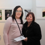 Pictured at the St Munchin's Photography Club's 'Moments in Time' Exhibition in the Belltable Arts Hub are Alison and Katherine Quinvilin. Picture: Conor Owens/ilovelimerick.