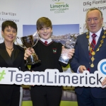 22/03/2018
Mary Killeen Fitzgerald, Senior Enterprise Development Officer with Limerick LEO and Councillor Stephen Keary, Mayor of Limerick City & County pictured with Evan Quaid from Hazelwood College pictured with his exhibit "Quaid Candles" at the Limerick Local Enterprise Office, Student Enterprise Programme Final Exhibition and Awards Presentation which took place at the Southcourt Hotel, Limerick.
Don Moloney / Press 22