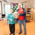 Pictured are the staff and students of Down Syndrome Limerick welcoming the Liam McCarthy cup along with retired hurler Seamus Hickey. Picture: Orla McLaughlin/ilovelimerick.