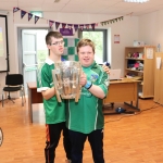 Pictured are the staff and students of Down Syndrome Limerick welcoming the Liam McCarthy cup along with retired hurler Seamus Hickey. Picture: Orla McLaughlin/ilovelimerick.