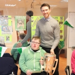 Pictured are the staff and students of Down Syndrome Limerick welcoming the Liam McCarthy cup along with retired hurler Seamus Hickey. Picture: Orla McLaughlin/ilovelimerick.