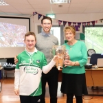 Pictured are the staff and students of Down Syndrome Limerick welcoming the Liam McCarthy cup along with retired hurler Seamus Hickey. Picture: Orla McLaughlin/ilovelimerick.