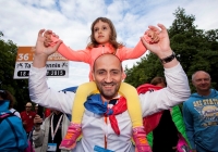 19/07/2015     REPRO FREE
The 36th World Medical and Health Games was officially opened by Minister Jan O’Sullivan at the University of Limerick on Sunday 19th July. The Games welcome over 1,000 athletes from more than 20 countries to compete across 25 different sports from golf and cycling to chess, fencing triathlon and football. This annual event brings medics from a range of medical professions, consultants, GP’s, nurses, paramedics who compete in a spirit of friendship in their chosen sport. 

 Ina Mircea aged 3 gets left from her faster Doru Mircea, of Team Romania as the teams make their way across the Living Bridge. Picture credit: Alan Place/Fusionshooters