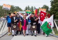 19/07/2015     
The 36th World Medical and Health Games was officially opened by Minister Jan O’Sullivan at the University of Limerick on Sunday 19th July. The Games welcome over 1,000 athletes from more than 20 countries to compete across 25 different sports from golf and cycling to chess, fencing triathlon and football. This annual event brings medics from a range of medical professions, consultants, GP’s, nurses, paramedics who compete in a spirit of friendship in their chosen sport. 

Minister for Education and Skills, Jan O'Sullivan joined the opening ceremony as it made its way across the Living Bridge. Picture credit: Alan Place/Fusionshooters